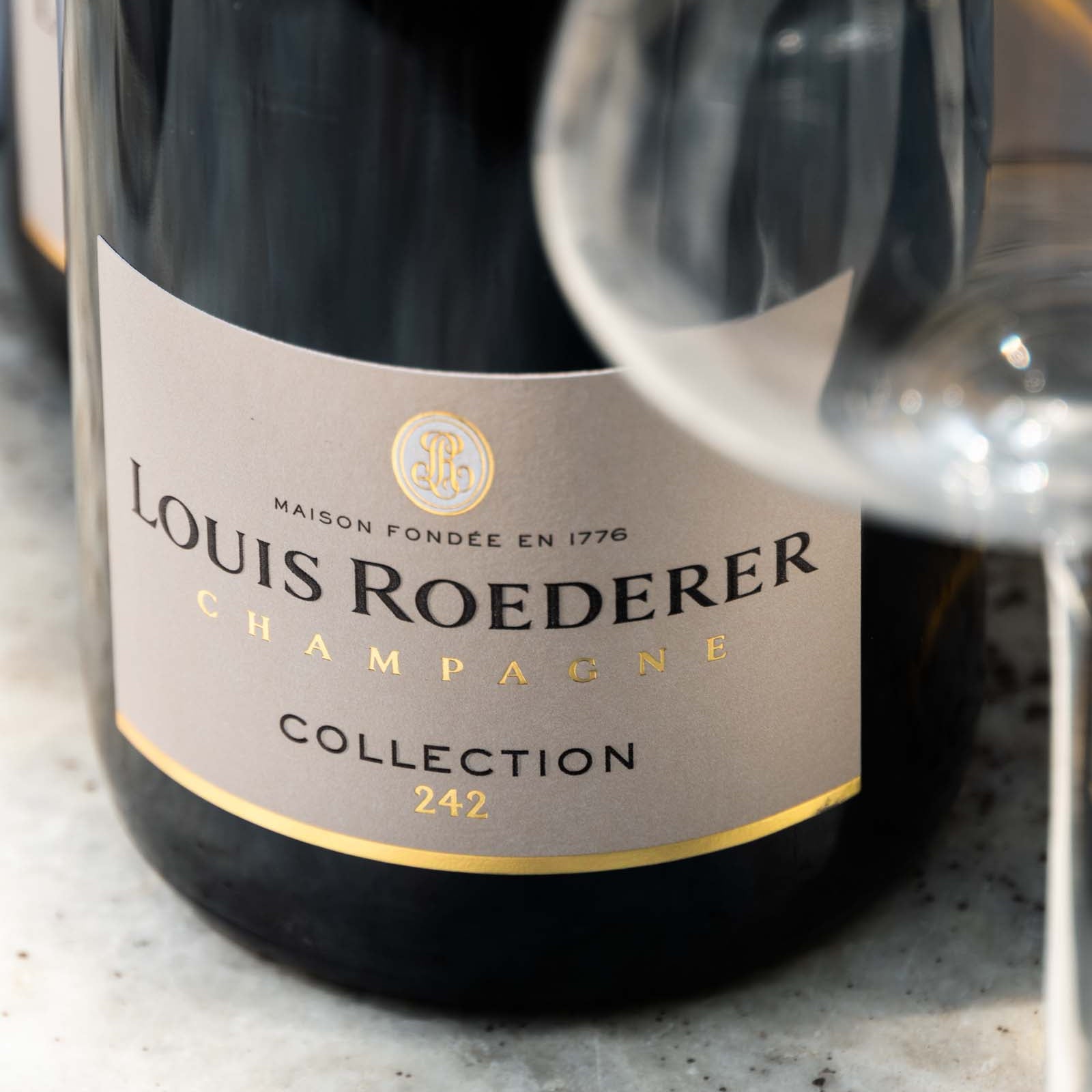Historien bag Louis Roederer champagne - PremiumBottles